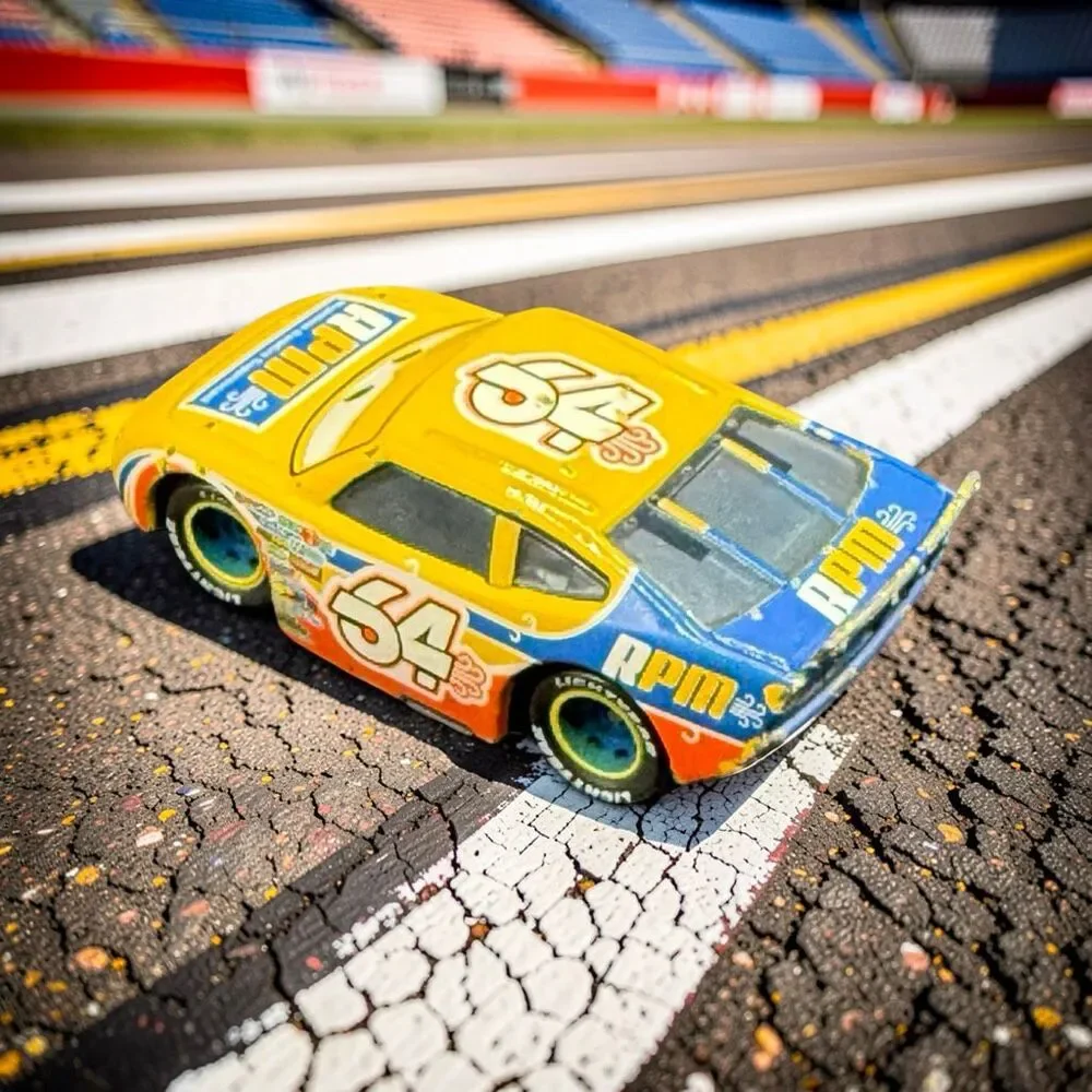 Disney Pixar Cars Winford Bradford Rutherford Yellow Die Cast Race Car A71